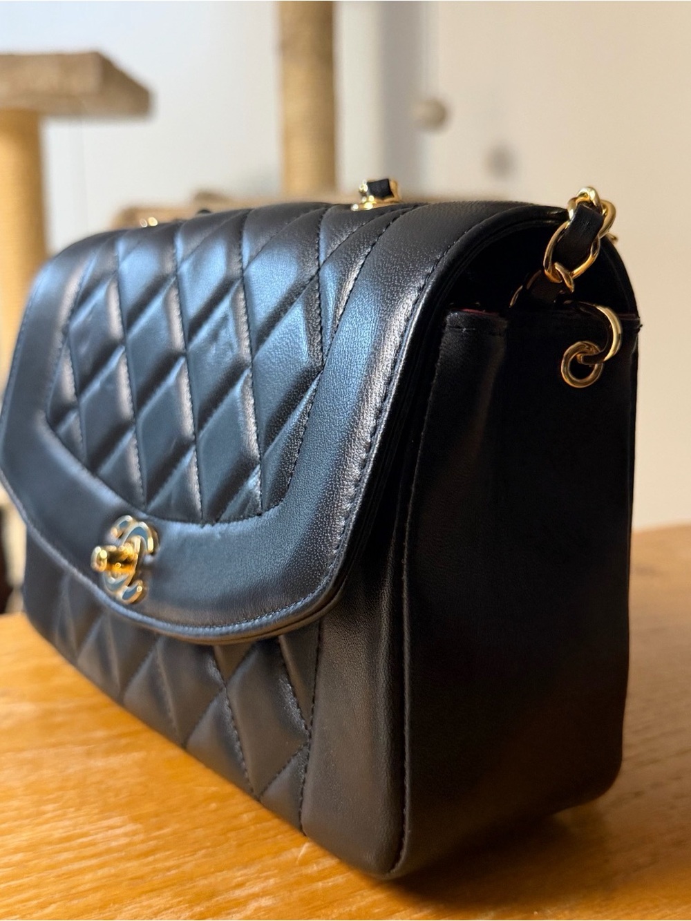 Black Quilted Leather Shoulder Bag with Gold Hardware